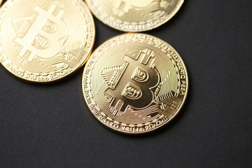 Bitcoin gold coin and chart background.
