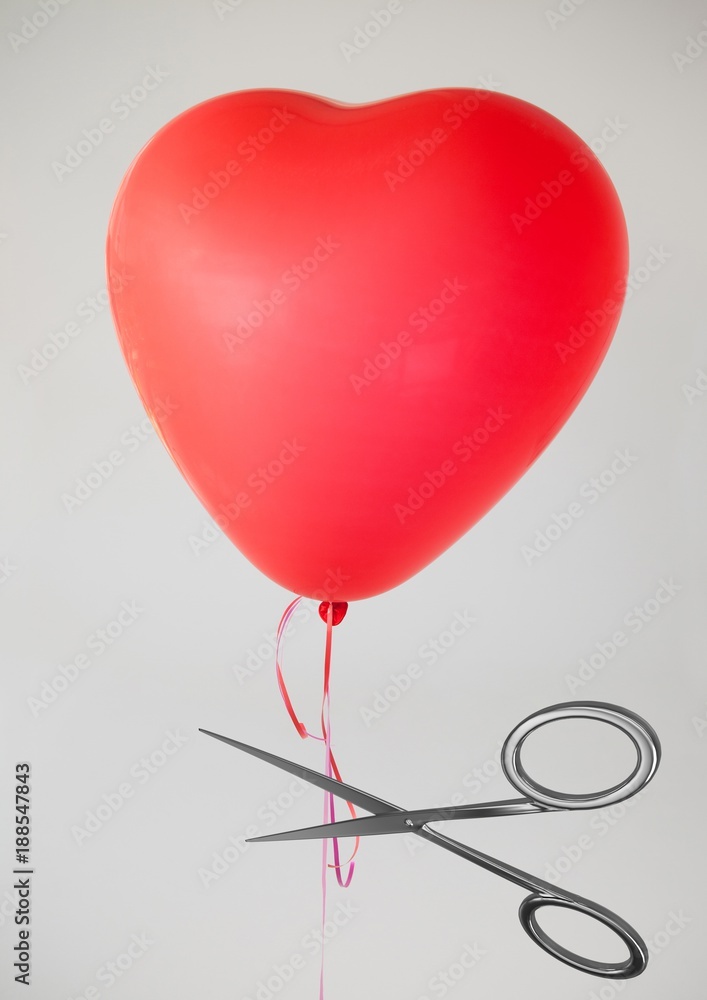 Poster scissors cutting heart balloon string