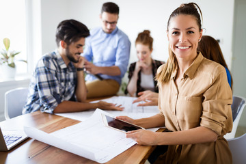 Image of business woman looking at tablet
