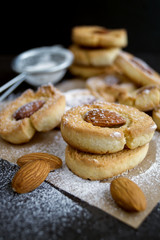 Homemade cookies with almonds and powdered sugar.