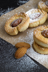 Homemade cookies with almonds and powdered sugar.