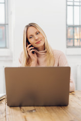 Businesswoman listening to a call on her mobile