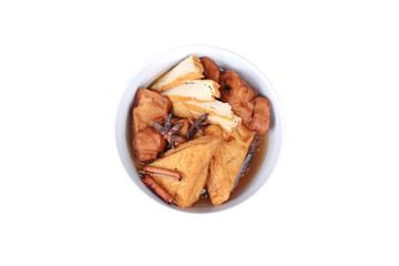 Chinese Vegetable festival  food as fried tofu and fermented flour in brown soup.