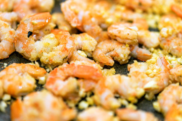 Close-up of shrimps fried in a frying pan