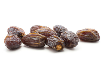 Date fruit Medjool stack isolated on white background.