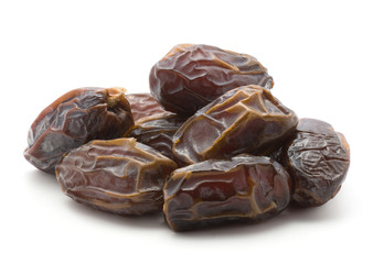 Date fruit Medjool heap isolated on white background.