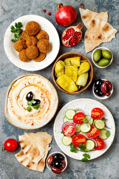 Middle Eastern traditional dinner. Authentic arab cuisine. Meze party food. Top view, flat lay, overhead