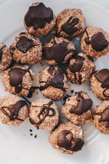 Top view of cocoa balls with dark chocolate on top