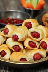 Homemade Pig in a blanket - Hot dog sausage rolls wrapped in a dough,close up
