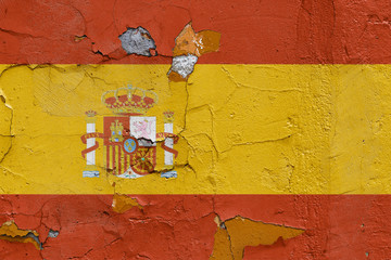 Spanish flag painted on a weathered concrete wall