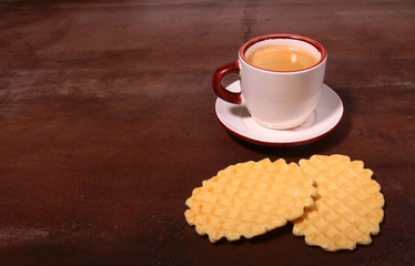 Wafel, caramel waffle and coffee cup, coffeebreak isolated on dark background