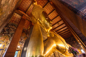 Big Golden buddha statue in Wat Phra Chettuphon Wimon Mangkhalaram Ratchaworamahawihan (Wat Pho) / Wat Pho public landmark of Bangkok