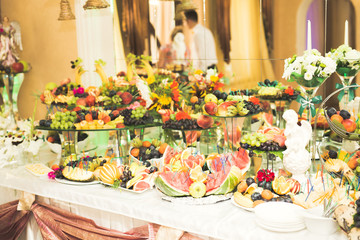 Different kinds of baked sweets on a buffet