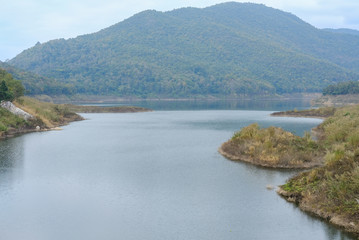 landscape of dam & forest on mountain. serene lake view