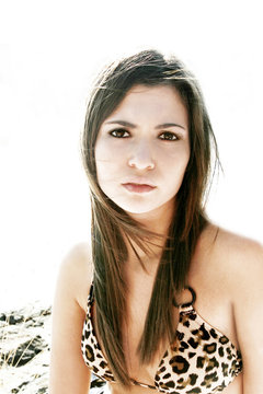 Portrait of young brunette woman in leopard print bikini&aring;&Ecirc;
