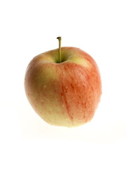wet apple on white background