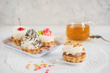 Tasty different cakes set with on a white background