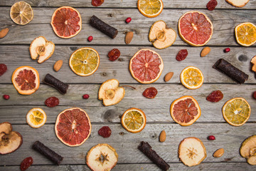 Different dried fruits on a wooden surface