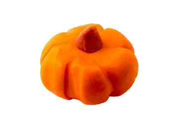 children's hands make pumpkin from clay on the white background