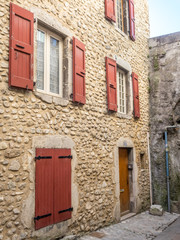 Fototapeta na wymiar Traditional old classic buildings architecture, windows and doors, in countryside area of France
