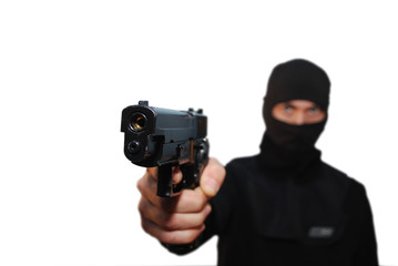 Criminal robber with aiming gun