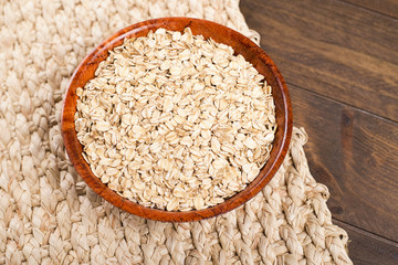 Container with oat flakes. Food