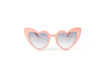 Pink heart shape sunglasses isolated