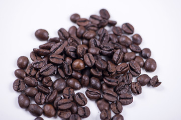 Background of of coffee beans on white background. Isolated.