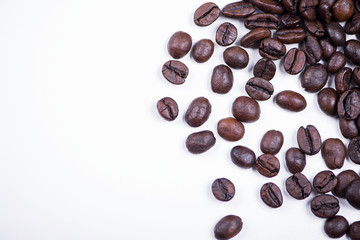 Background of of coffee beans on white background. Isolated.