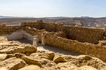 Ruins of the ancient fortress of Massada on the mountain near the dead sea in southern Israel

