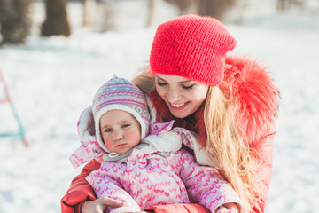 Fototapeta na wymiar Portrait of mother and daughter in winter