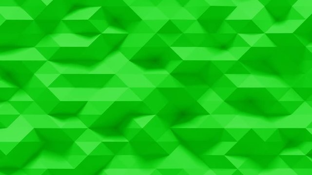 Abstract Polygonal Geometric Surface Loop 4G: green clean soft low poly motion background of shifting small triangles in sensible fresh natural lime spa aloe leaf green. Seamless loop 4K UHD FullHD.
