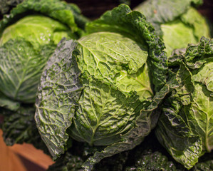 Fototapeta premium Savoy cabbage super food on market stall at organic farmers grocery store.