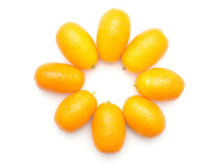 Kumquat folded in flower top view isolated on white background.