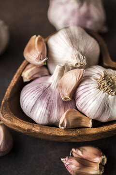 Fresh garlic on wooden background. Garlic bulbs