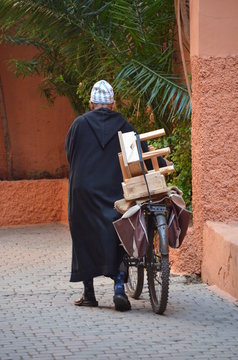 Man on Bicycle in the medina of Marrakech