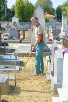Man working in graveyard