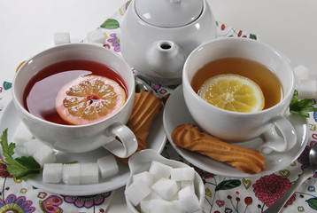 fruit tea with a cookie in white porcelain