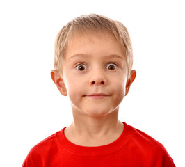 Happy cheerful boy. Portrait of a teenager. A boy on a white background. An emotional person.