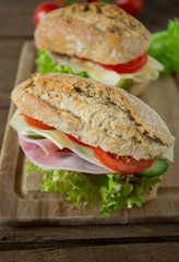 Wholegrain Ciabatta Sandwich with Lettuce, Tomatoes, Ham and Cheese