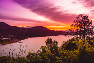 Sunset on the lake and mountains on Bali