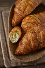 fresh croissant over wood