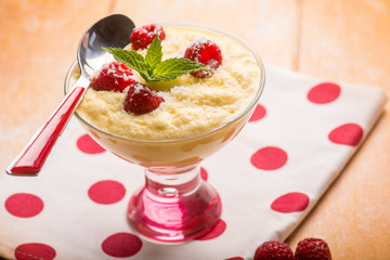 mousse with raspberries and coconut, selective focus