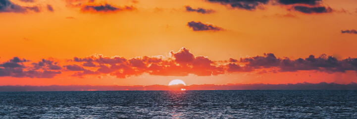 Panorama Of Sundown Over Sea Horizon At Sunset. Natural Sunrise 