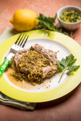 meat with gremolada traditional italian recipe, selective focus
