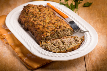 meatloaf with potatoes and parsley, selective focus