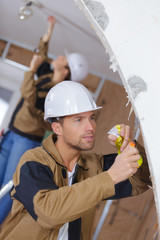 facade builder plasterer at work