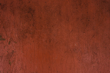 Wooden surface painted in orange rusty color, grunge background
