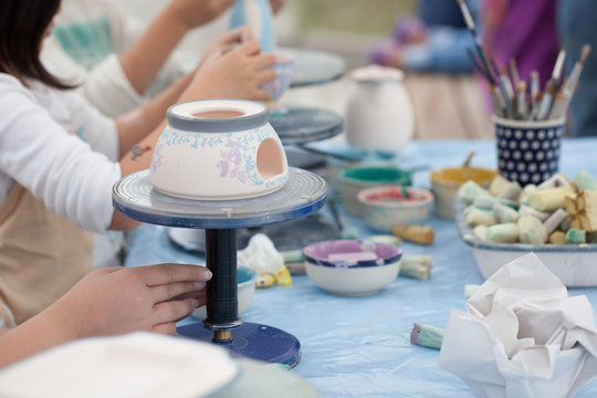 Painting Ceramics - Children Painting Ceramic Dishes