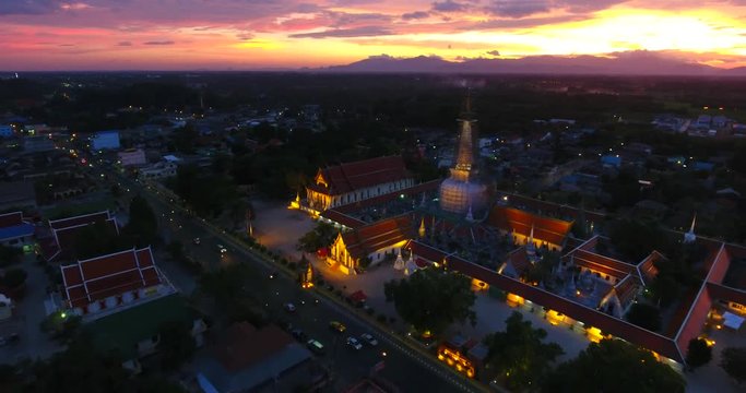 4K Aerial Movie of Ancient pagoda at Nakornsri thammarat in Sunset Scene, Thailand